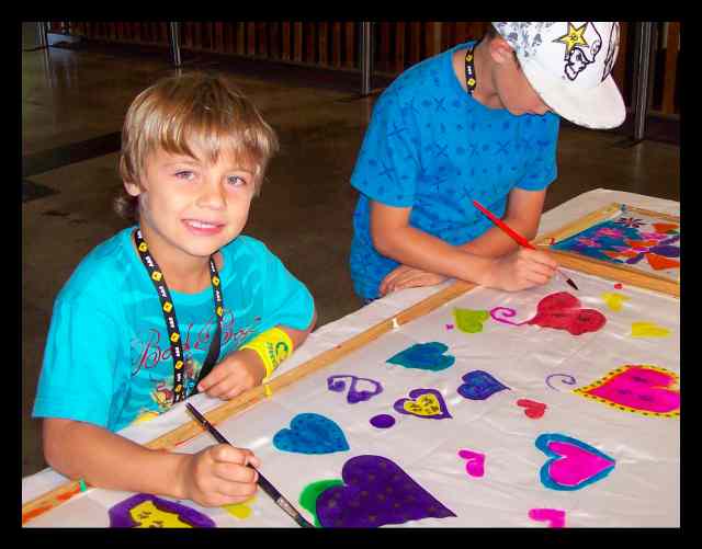 Boys love learning how to paint on silk with Teena Hughes at the Royal Easter Show in Sydney, 12th April 2010 Boys love learning how to paint on silk at the Royal Easter Show in Sydney, 12th April 2010